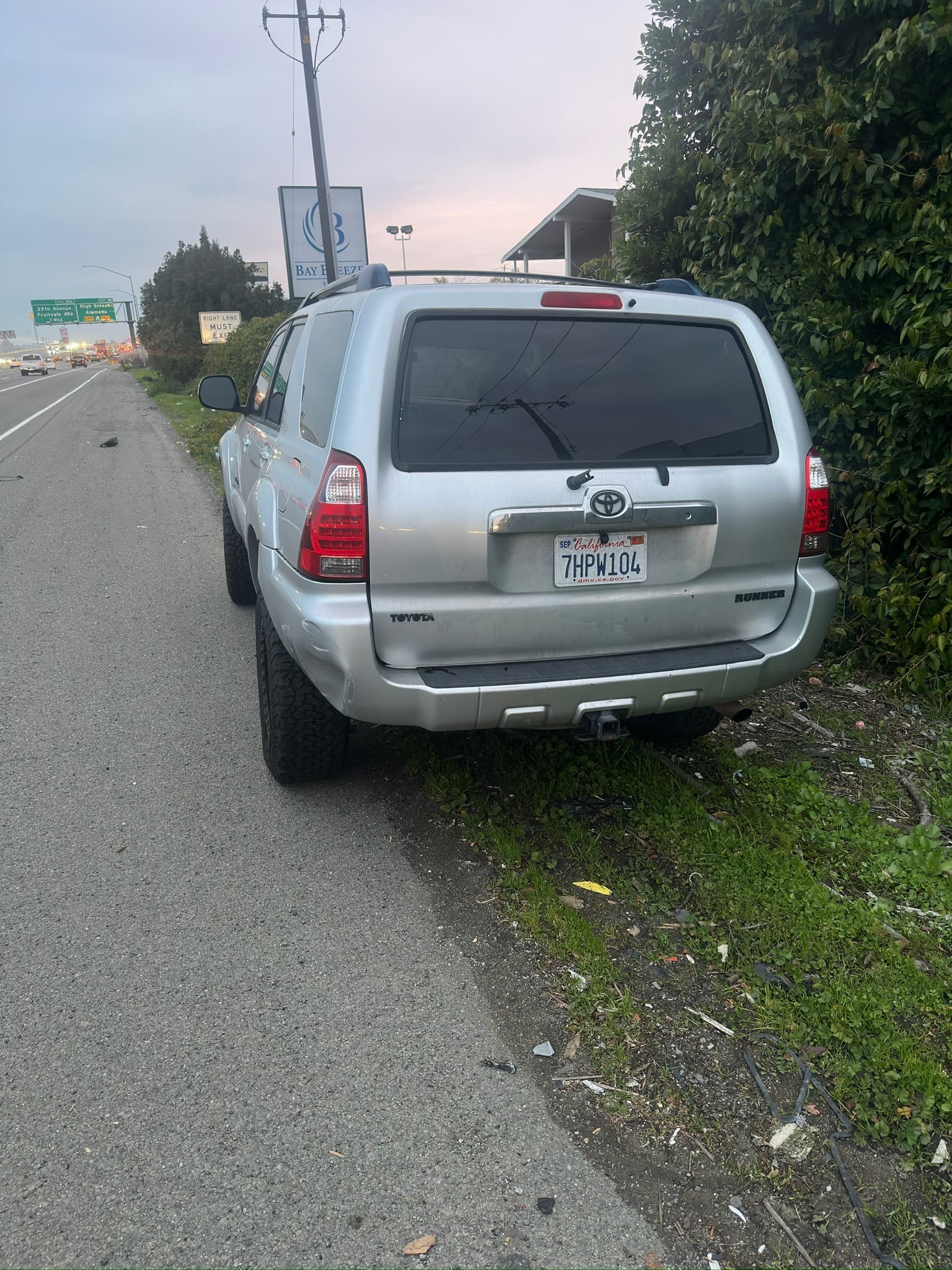 Rear view of the silver Toyota 4Runner attached to Report 03